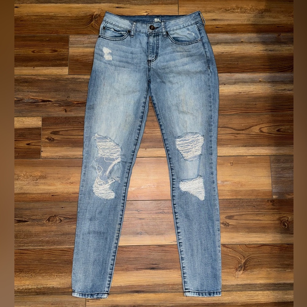 Light blue ripped jeans